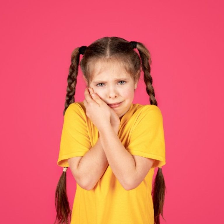 unhappy-preteen-girl-suffering-from-tooth-ache